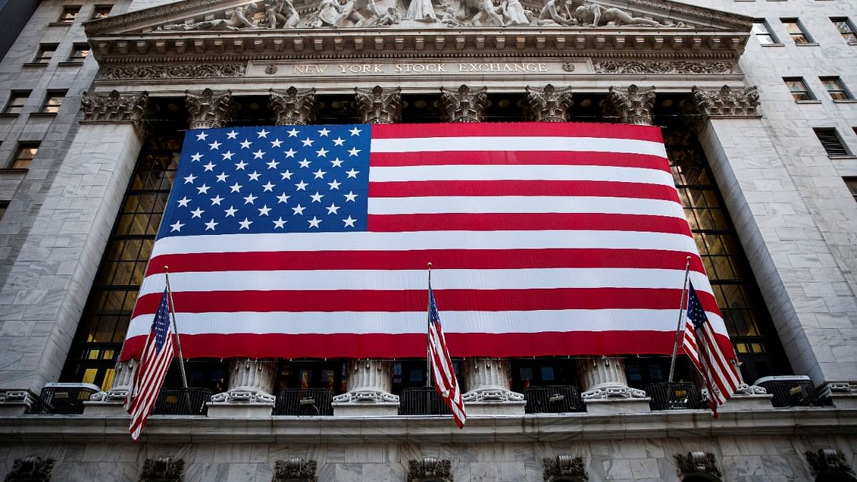 Seen here is a flag of the United States covering the facade of the New York Stock Exchange on Wall Street to commemorate the 20th anniversary of 9/11 | Credit: Reuters Photo
