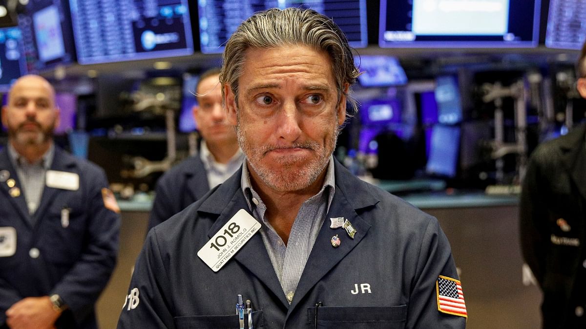 Traders in the new York Stock Exchange, too, paused for a moment to commerate the 20th anniversary of 9/11 | Credit: Reuters Photo