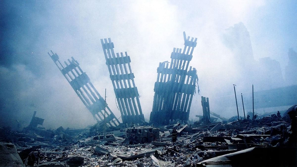The rubble of the twin towers of the World Trade Center smoulder following a terrorist attack in lower Manhattan, New York. Credit: AFP/File Photo