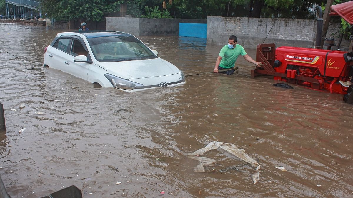 Heavy rains lashed several parts of Delhi on September 11 after a heavy spell a day before that saw waterlogging in several parts of the city. Credit: PTI Photo