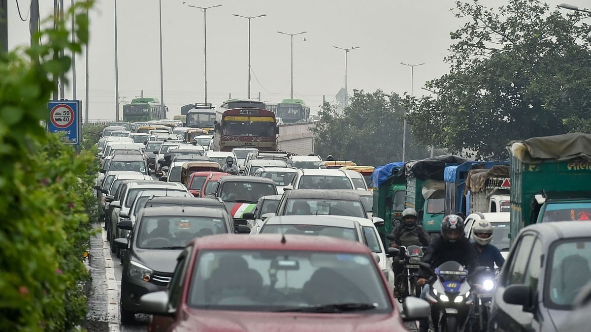 As rains continued to lash Delhi, extensive waterlogging and traffic jams were reported at various areas in the capital. Credit: PTI Photo