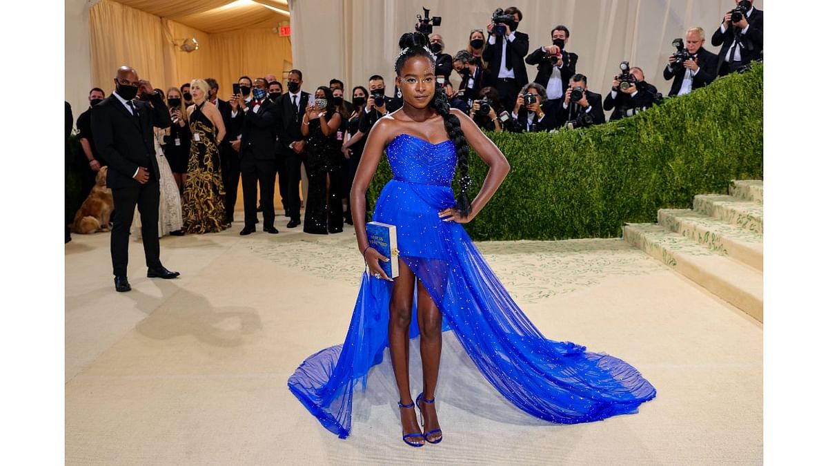 Poet Amanda Gorman chose a blue Vera Wang gown and crystal laurel crown headpiece. Credit: AFP Photo