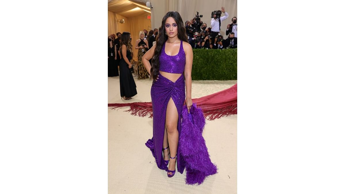 Camilla Cabello was seen in a purple sparkly crop top and skirt. Credit: AFP Photo
