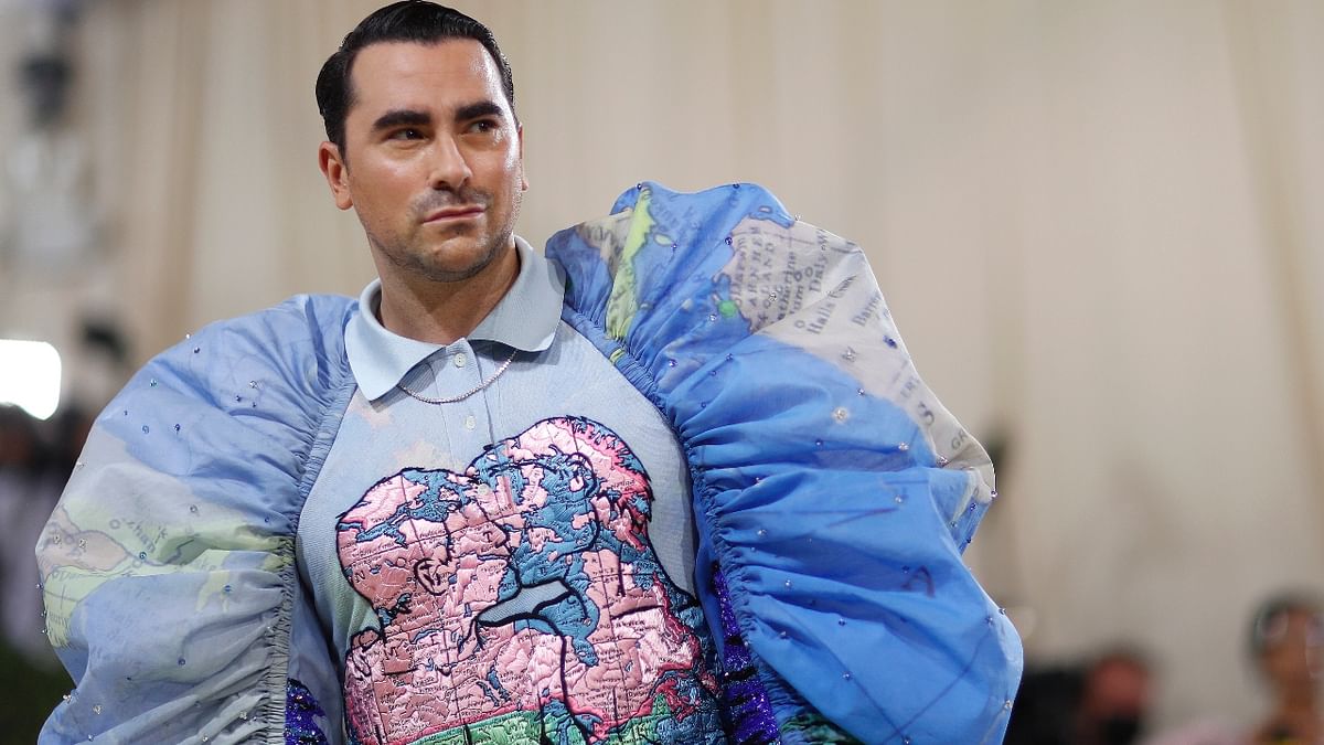 'Schitt's Creek' actor Dan Levy opted for a bold, puff-sleeved creation featuring an artwork on the front that showed two men kissing. Credit: Reuters Photo
