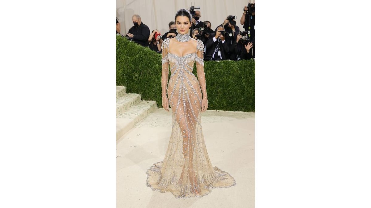 Kendall Jenner stunned all in a figure hugging sheer, jewelled dress. Credit: AFP Photo