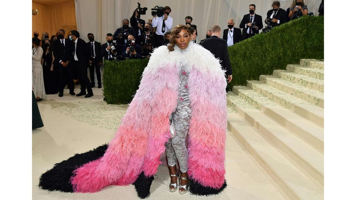 Tennis sensation Serena Williams arrived in a body-hugging jumpsuit paired with a feathery overcoat. Credit: AFP Photo