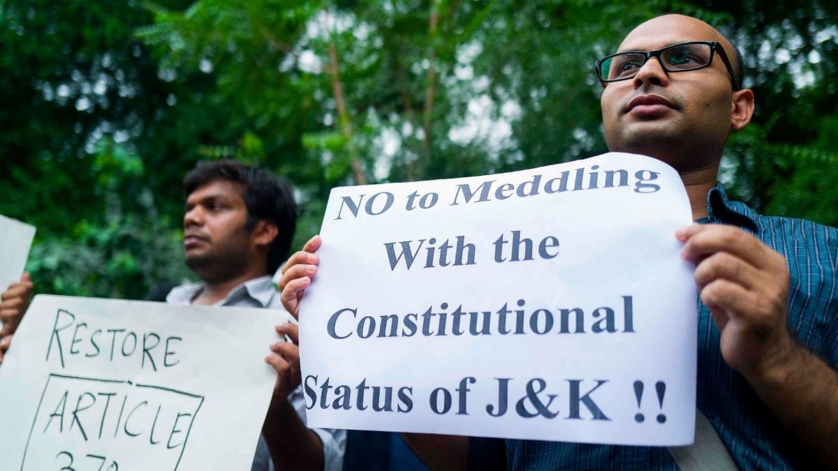 Abrogation of Article 370 in Jammu and Kashmir | The Modi government fulfilled another one of its poll promises on August 5,2019 when it ended Jammu and Kashmir's special status and statehood by abrogating Article 370 in Parliament. The government said that the move would help a number of Kashmiri Pandits living elsewhere — some as refugees — return to their homeland. The abrogation of Article 370 also saw the Union Territory split into two — Jammu and Kashmir, and Ladakh | Credit: AFP File Photo