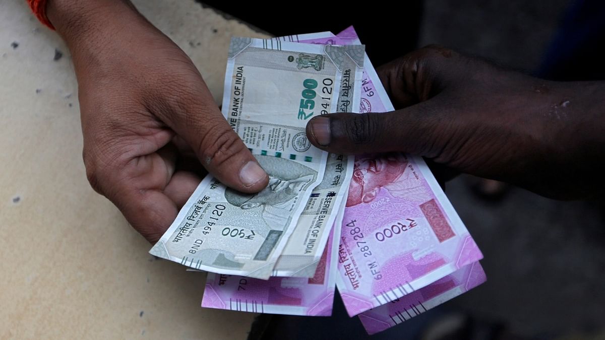 Demonetisation | The Narendra Modi government's decision on November 8, 2016 that demonetised the existing Rs 500 and Rs 1,000 notes and introduce a new Rs 500 note and a new denomination Rs 2,000  — touted as a move to weed out black money and trigger a shift towards digital currency — dented thousands of individuals and businesses, with the memory of long lines outside ATMs still fresh. Credit: Reuters File Photo