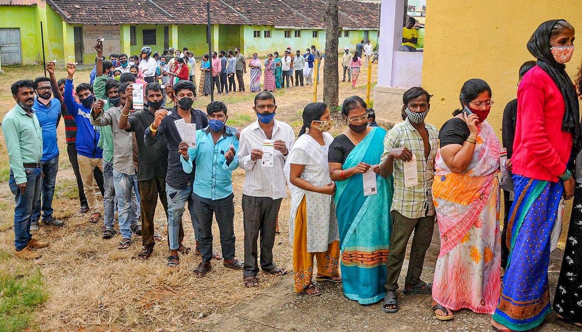 Beneficiaries wait to receive a dose of Covid-19 vaccine at a special camp organised on the occasion of Prime Minister Narendra Modi's 71st birthday, in Chikmagalur, Karnataka. Credit: PTI Photo