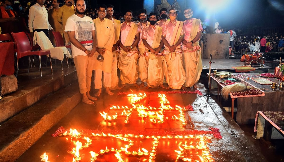 In Varanasi, traditional lamps were lit and priests performed special Ganga aarti performed at Dashashwamedh Ghat. Credit: PTI Photo