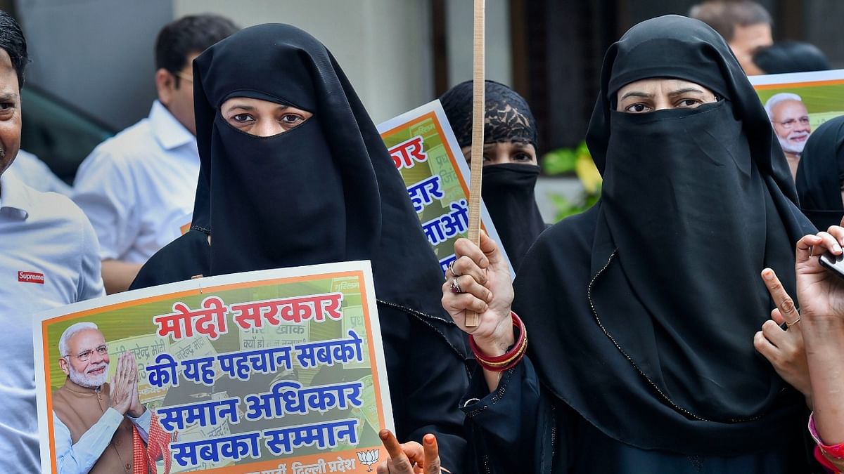Criminalising triple talaq | One of the Modi government's poll planks in both 2014 and 2019, the practice of triple talaq — a means of instant divorce practiced among some Muslim men by uttering/writing 'talaq' thrice — was criminalised on August 1, 2019. Last month, the Centre announced that it would observe August 1 as 'Muslim Women Rights Day' to commemorate the passage of the Bill. Credit: PTI File Photo