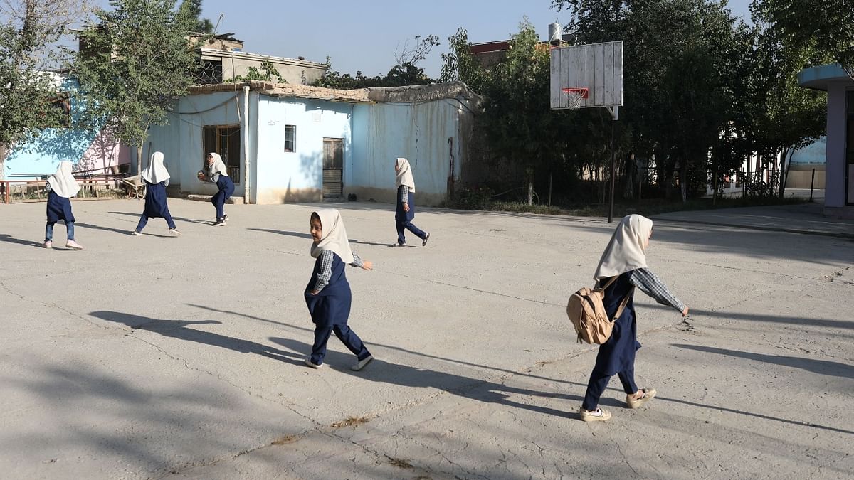 Taliban officials say they will not return to the fundamentalist policies - including a ban on girls receiving education - implemented when they last ruled Afghanistan from 1996 to 2001. They have now promised that girls will be able to study - but only in segregated classrooms. Credit: WANA (West Asia News Agency) via Reuters Photo