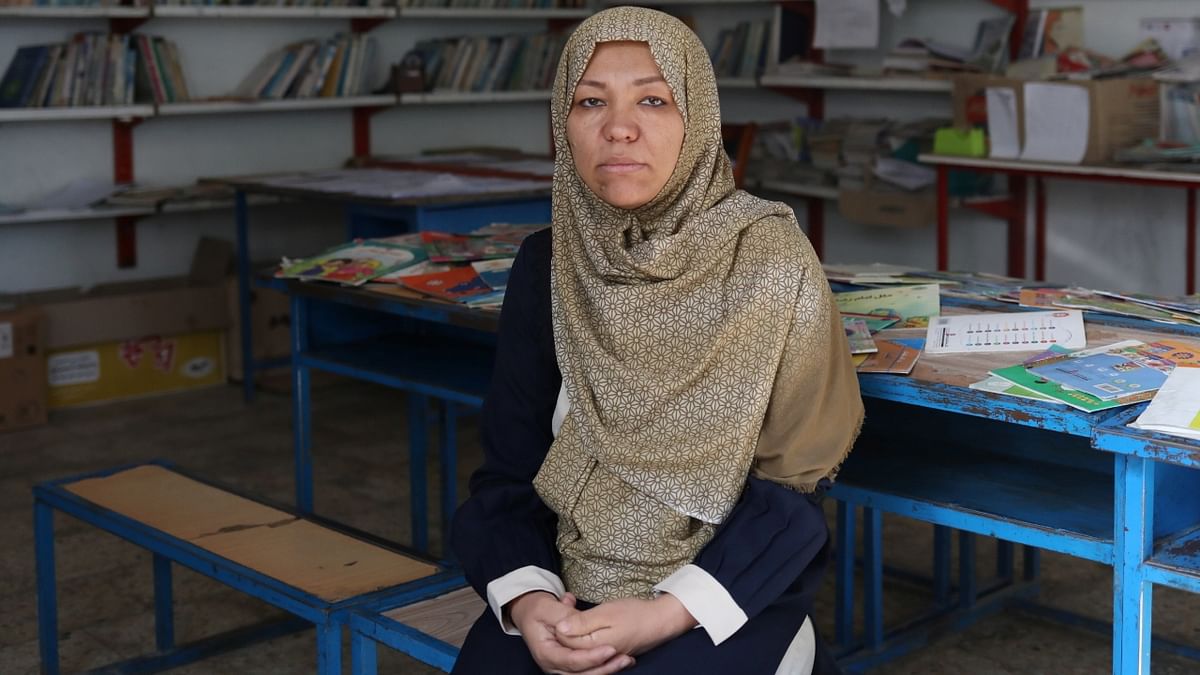 Hadith Rezaei, dean supervisor, poses for a photo at a school in Kabul. Credit: WANA (West Asia News Agency) via Reuters Photo