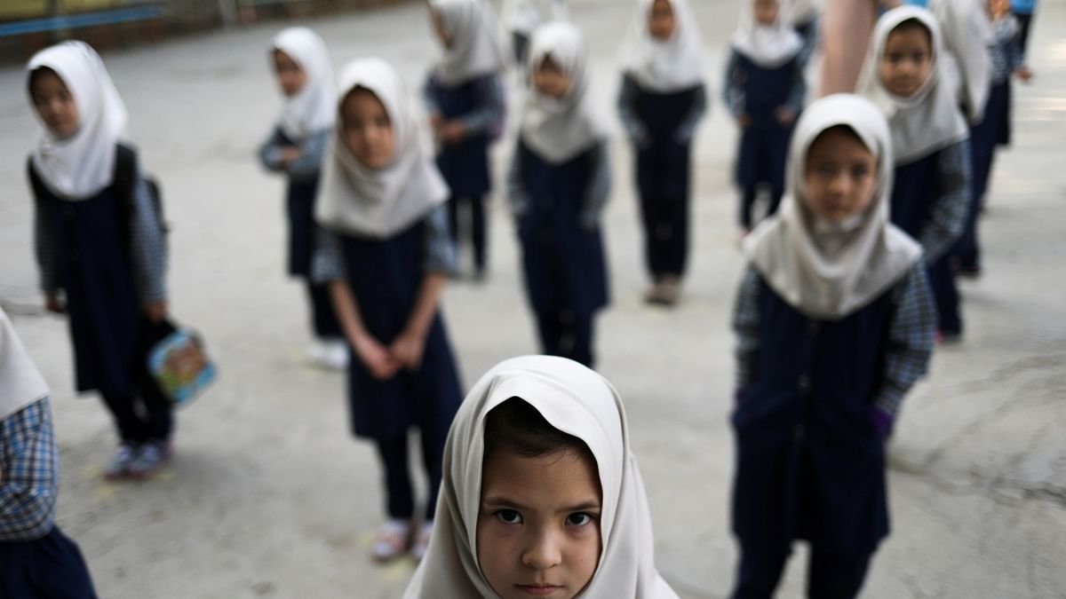 Schools in Kabul had made changes in the seating arrangements for girls and boys in order to reopen. Credit: WANA (West Asia News Agency) via Reuters Photo