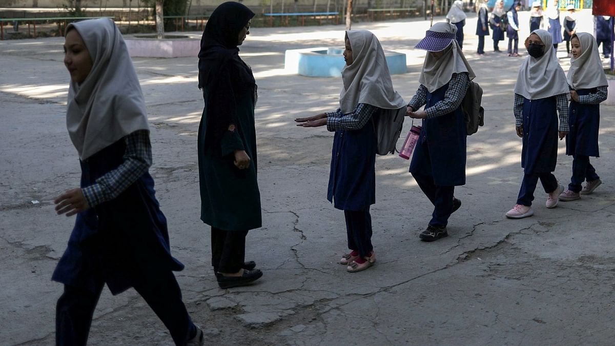 Afghan girls stand in line at a school in Kabul. Credit: WANA (West Asia News Agency) via Reuters Photo