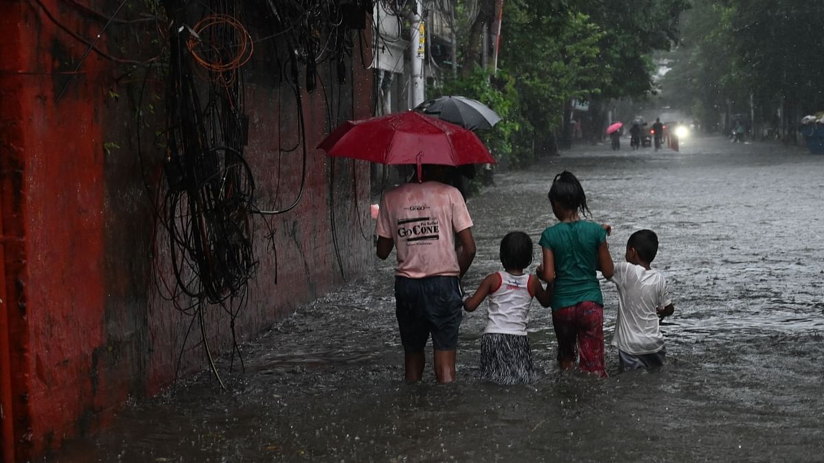 Torrential rains threw normal life out of gear, as the Met forecast more downpour for at least another day. Credit: AFP Photo