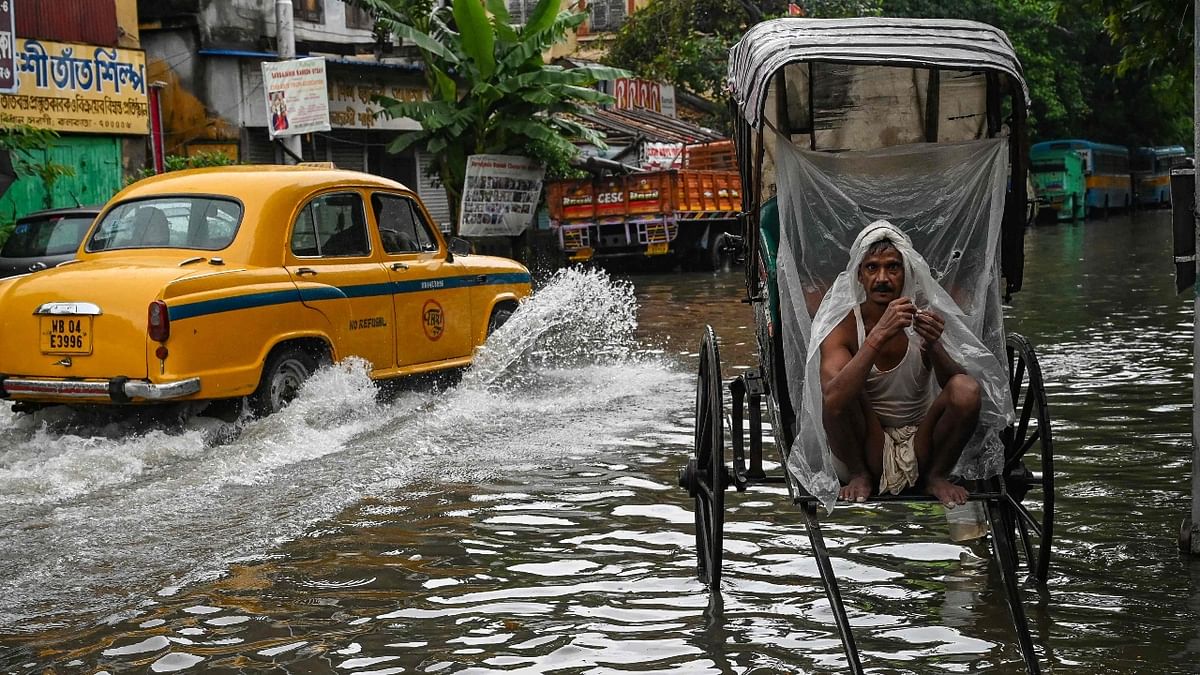 The drainage pumping stations of Kolkata Municipal Corporation recorded 136 mm rain at Dhapa, 115 mm at Kalighat and 109 mm at Ballygunge overnight, an official said. Credit: AFP Photo