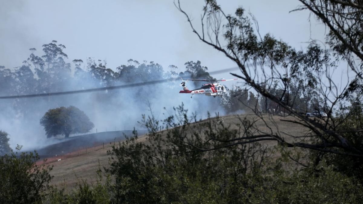 A CalFire helicopter responds to a fire incident in Petaluma, California. Credit: Reuters photo