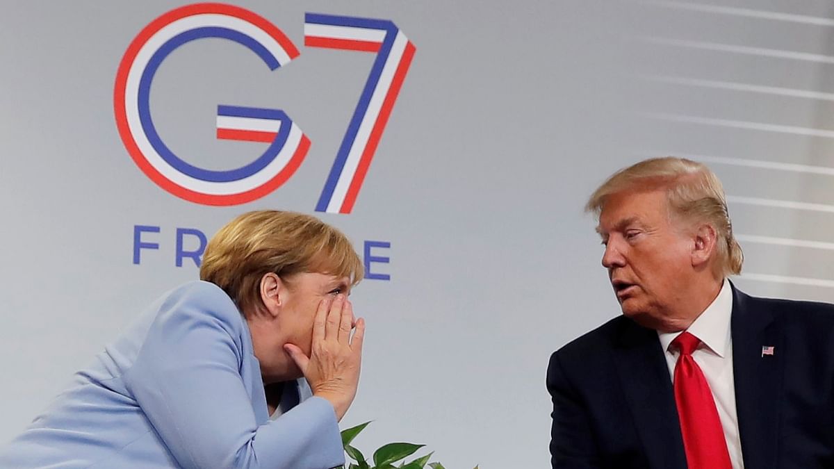 Merkel offered Trump her cooperation but only on the basis of democratic values -- an unheard of shot across the bow to Washington. That would start four years of fractious ties, and fans leapt on an image of Merkel and Trump at a stormy G7 summit in Canada as an illustration of how she was trying to keep the US leader on the straight and narrow. Credit: Reuters Photo