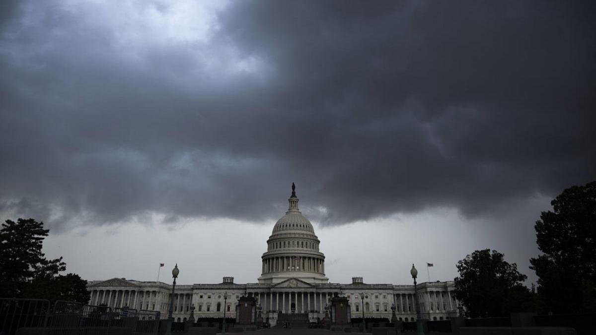 Storm clouds gather near the US Capitol on Wednesday afternoon September 22, 2021 in Washington, DC. Credit: AFP Photo