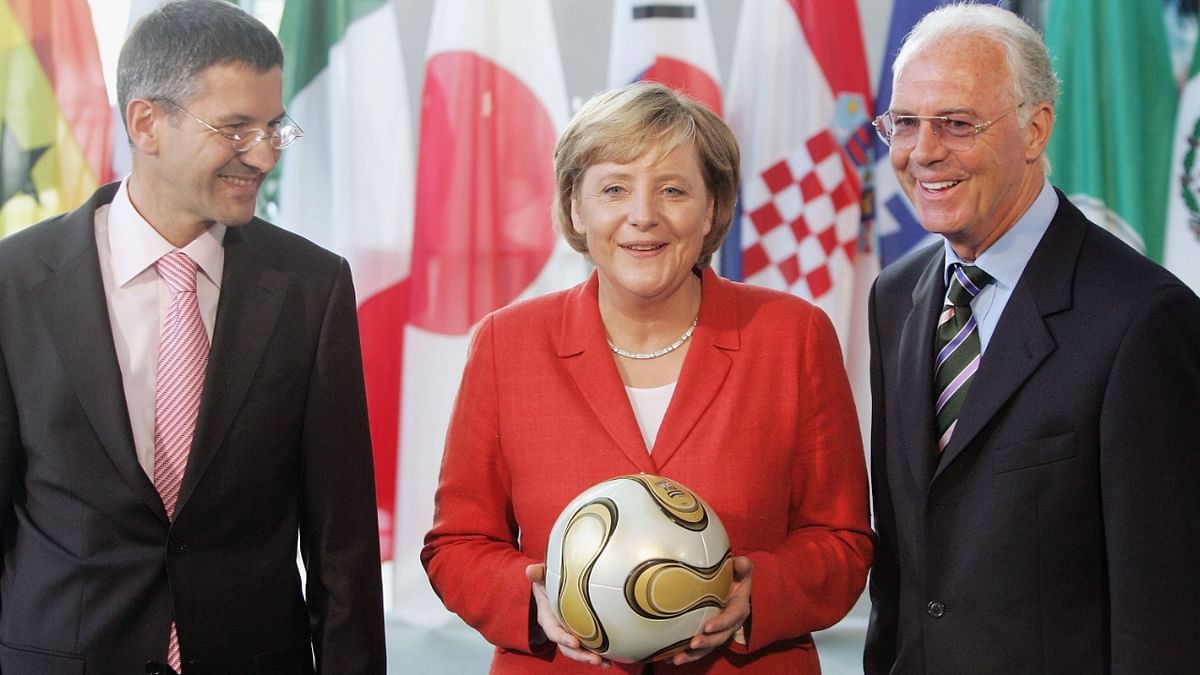 In 2005, her conservative CDU-CSU alliance narrowly won the election and Merkel was sworn in as Germany's first female chancellor in November. Barely a year in office, Germany's new chancellor would play host to the world's most-watched game -- at the 2006 football World Cup. Credit: Getty Images