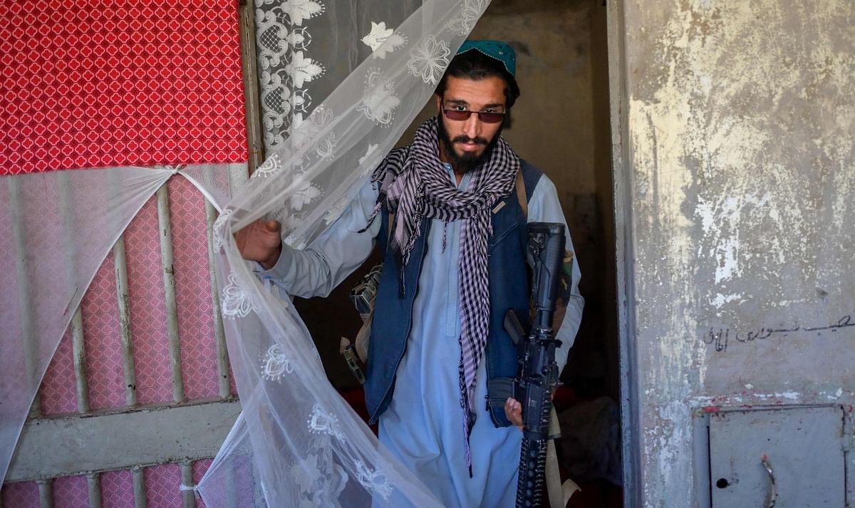 A member of the Taliban walks inside the Pul-e-Charkhi prison in Kabul. Credit: AFP Photo