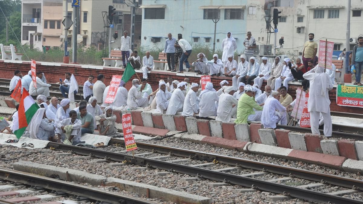 In Sonipat, farmers from the United Kisan Morcha blocked railway tracks during their protest. Credit: PTI Photo