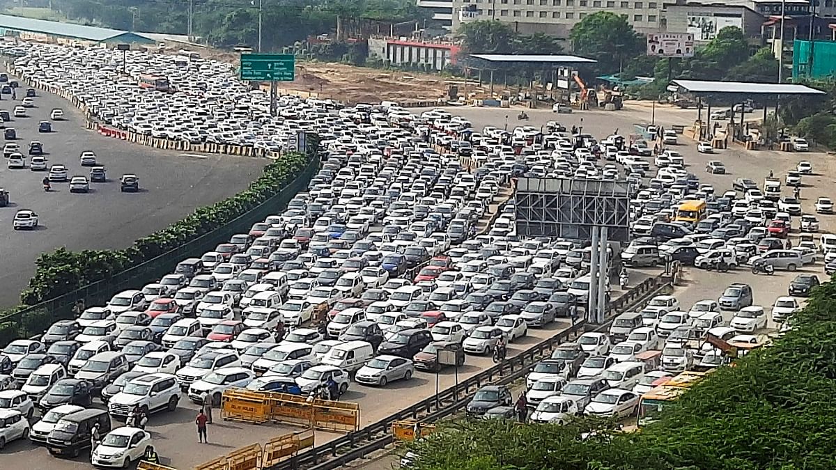 The Delhi-Gurugram Expressway witnessed a massive traffic jam after police put up barricades in view of the Bharat Bandh. Credit: PTI Photo