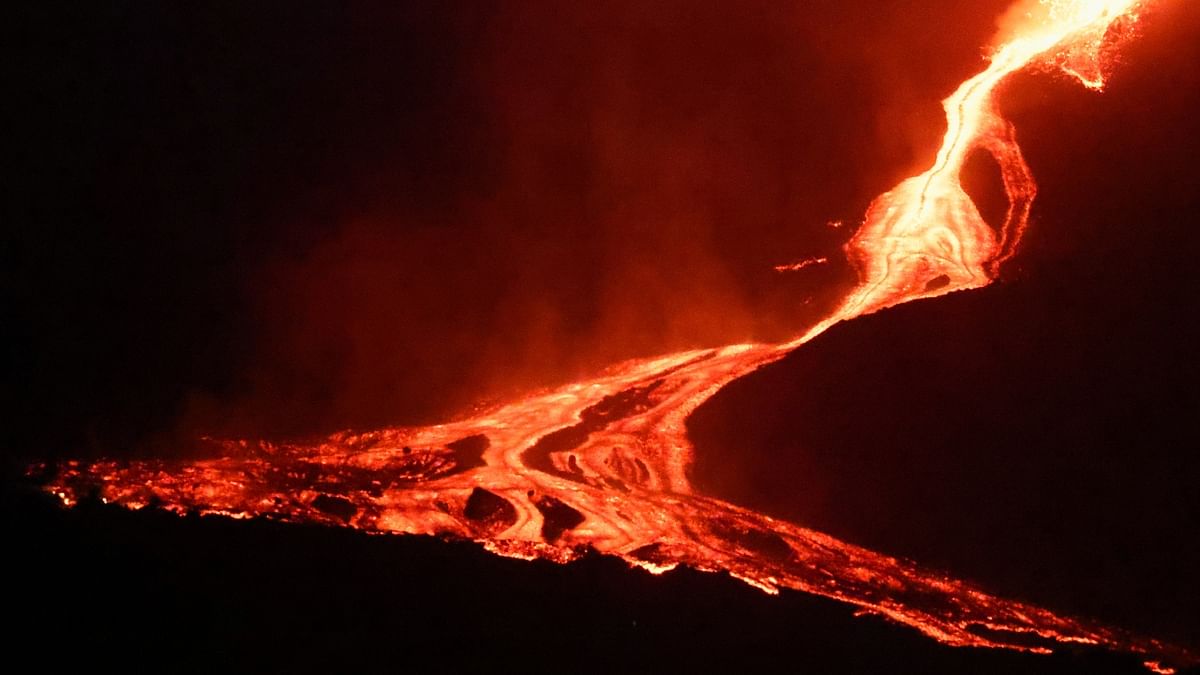 La Cumbre Vieja, which straddles a southern ridge in La Palma in the Atlantic archipelago, erupted on September 19, spewing out rivers of lava which have slowly crept towards the sea. Credit: Reuters Photo