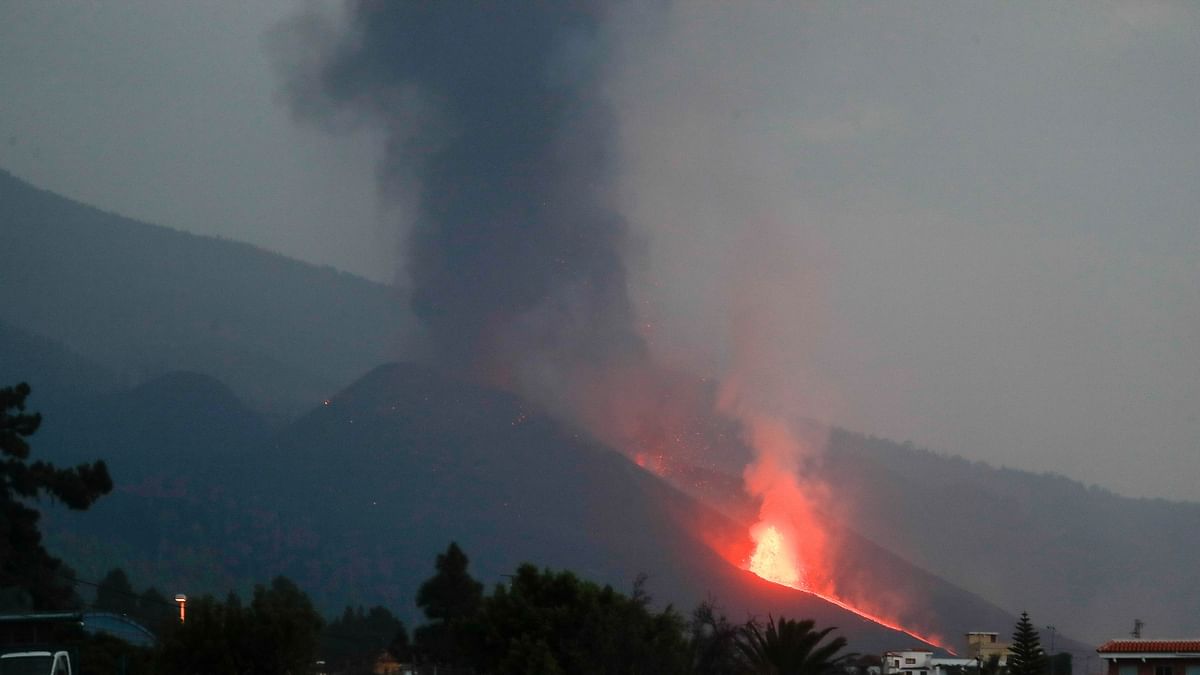 Smoke had continued to emerge from the top during the lull. Credit: Reuters Photo
