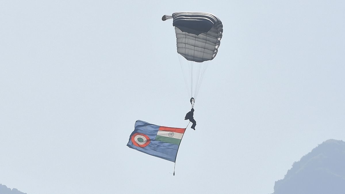 Team members opened their parachutes and displayed various formations, the Indian national flag, the IAF flag, and the Akash Ganga flag rippled in the sky. Credit: PTI Photo