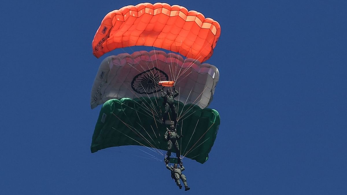 The IAF's Akash Ganga skydiving and Suryakiran Aerobatic Display teams took part in it. Credit: AFP Photo
