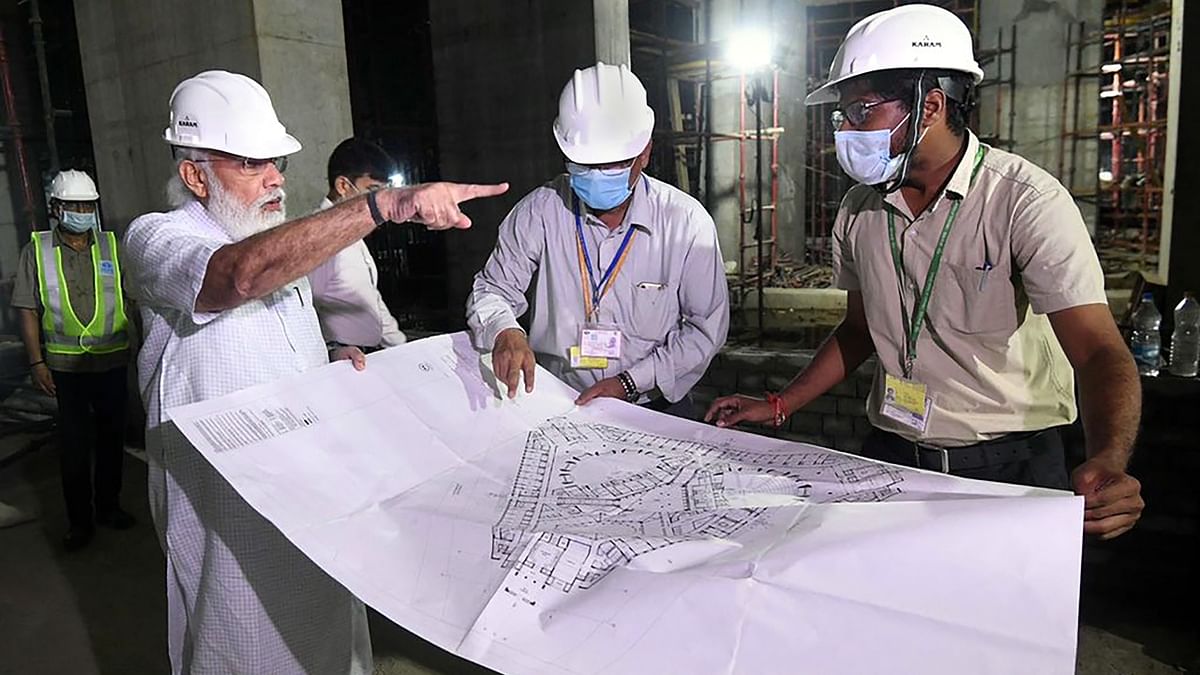 Modi also spoke to people involved in the construction as he inspected the ongoing work. Credit: PTI Photo