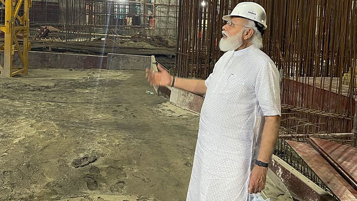 Prime Minister Narendra Modi gestures as he inspects the Cental Vista Project construction work in New Delhi. Credit: PTI Photo