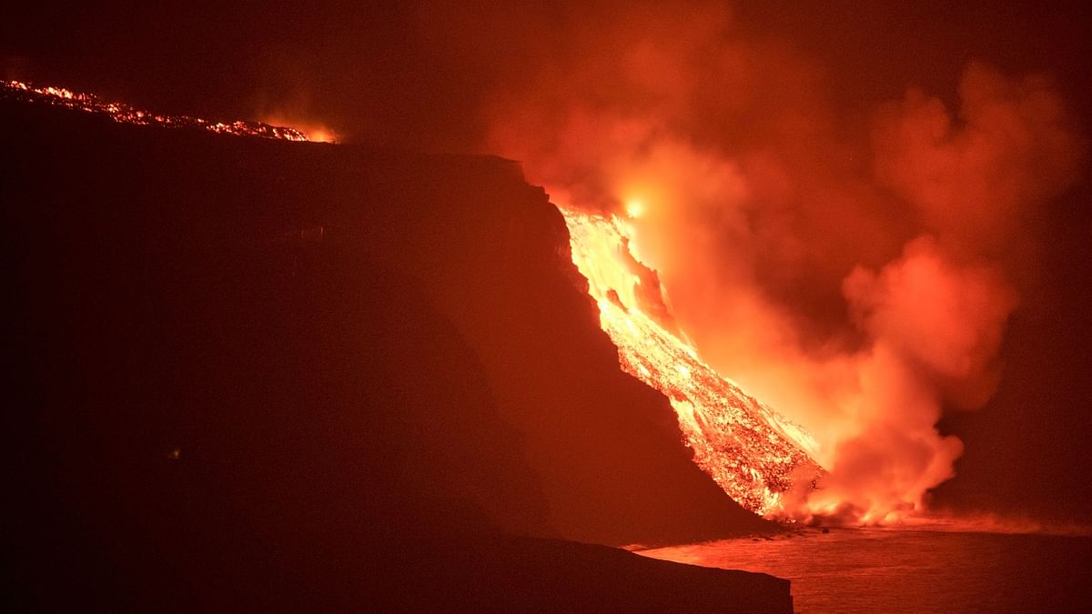 The immediate area had been evacuated for several days as authorities waited over a week for the lava that began erupting September 19 to traverse the 6.5 kilometers (4 miles) to the island's edge. Credit: AP Photo