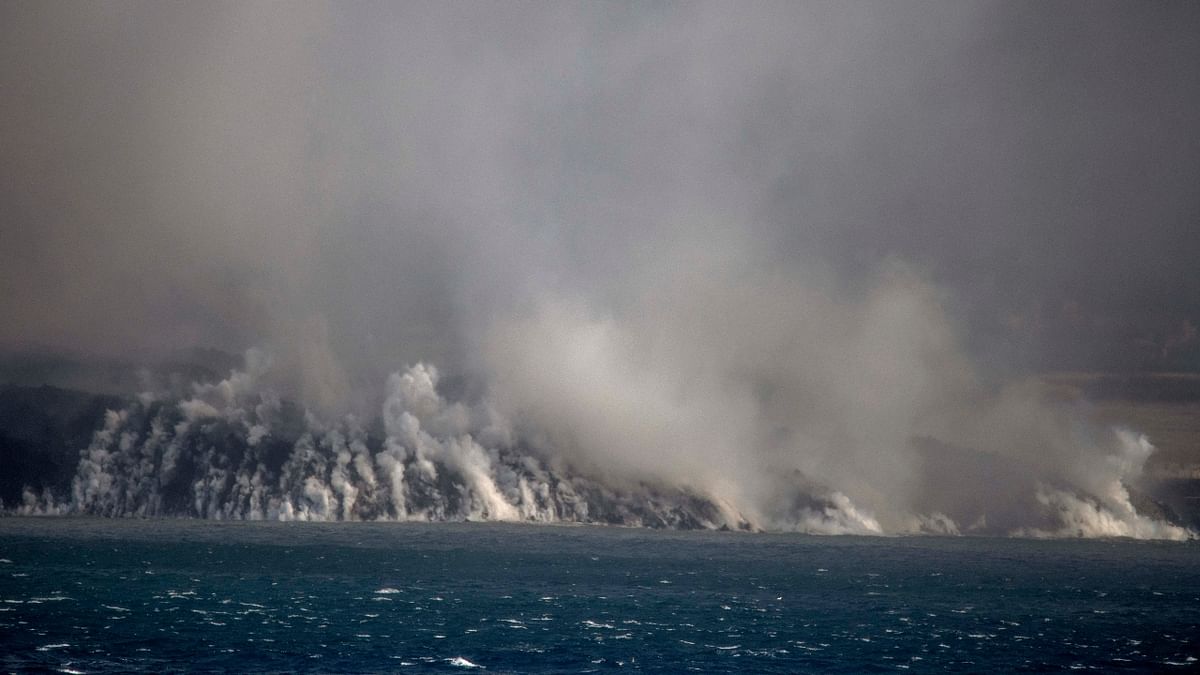 Even though their initial readings of the air quality showed no danger in the area, experts had warned that the arrival of the lava at the ocean would likely produce small explosions and release toxic gases that could damage lungs. Credit: AP Photo