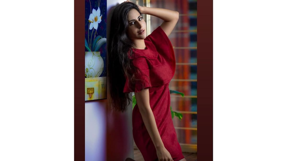Oozes hotness in this red velvet dress. Credit: Instagram/alinarai07