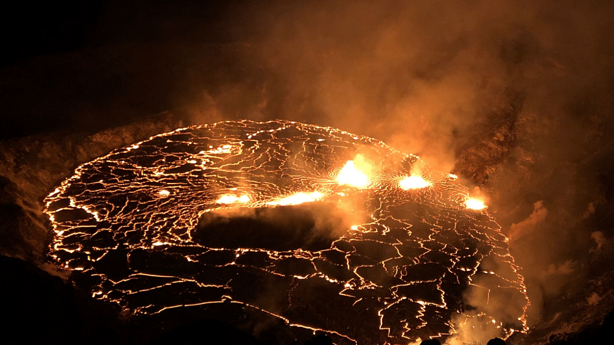 The continuing eruption of Kilauea Volcano in Hawaii, fountaining at multiple fissure locations on the base and west wall of the crater, and a lava lake growing within Halema'uma'u. Credit: AFP Photo