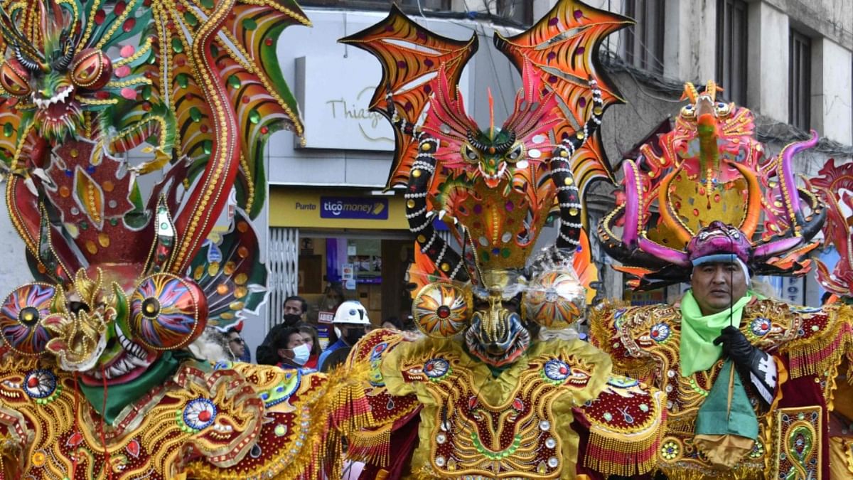 Dancers perform the Diablada Dance (Dance of the Devils) in the streets of Oruro, Bolivia on October 1, 2021, amid a dispute with neighbouring Peru over its origin. Credit: AFP Photo