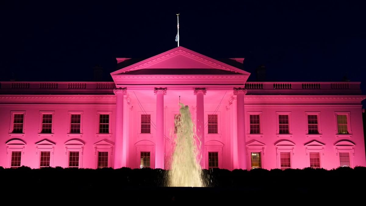 The White House is illuminated in pink for Breast Cancer Awareness Month, in Washington. Credit: Reuters Photo