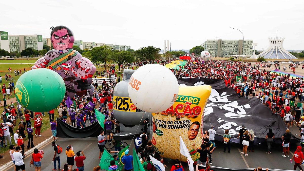 Demonstrators take part in a protest against Brazilian President Jair Bolsonaro's government in Brasilia. Credit: AFP Photo