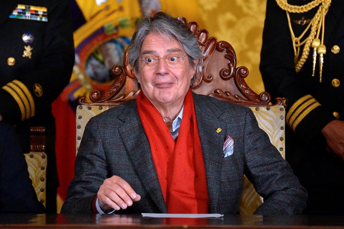 One of the 330 current and former politicians identified as beneficiaries of the secret accounts includes the name of Ecuador's President Guillermo Lasso. Credit: AFP File Photo