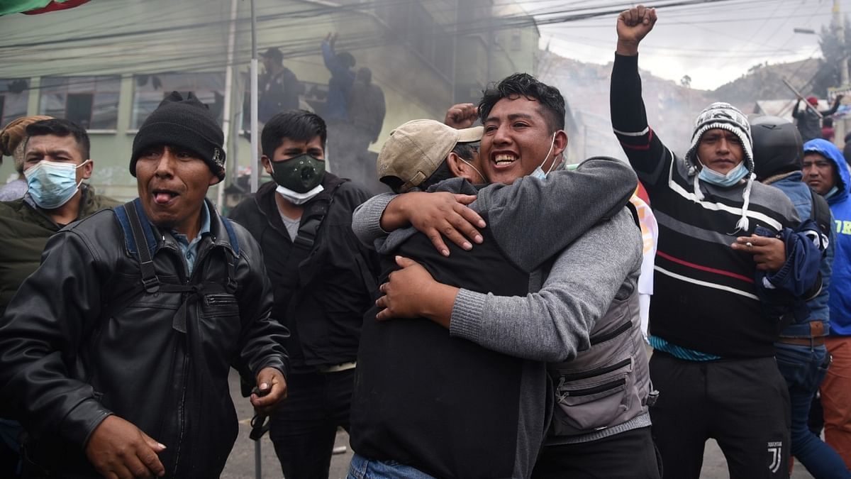 Demonstrators celebrate taking control of La Paz's coca market after a confrontation with police, in La Paz, Bolivia. Credit: Reuters Photo