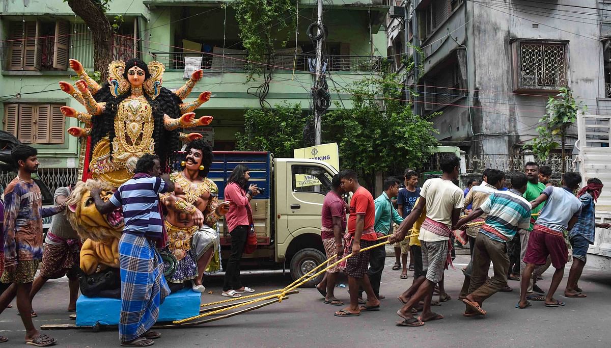 For the second year in a row, Kolkata is getting ready to host a quiet 'pujo' amid the Covid-19 pandemic. Credit: PTI Photo