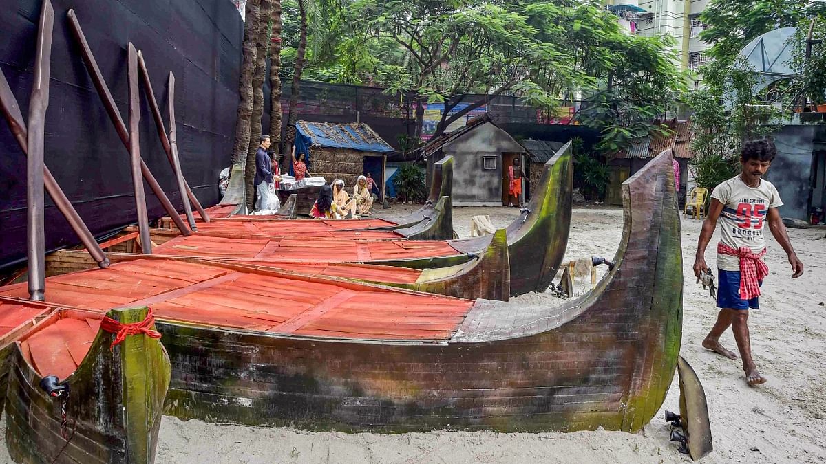 A community puja pandal themed on 'Cyclone Yaas hit Sundarban'. Credit: PTI Photo