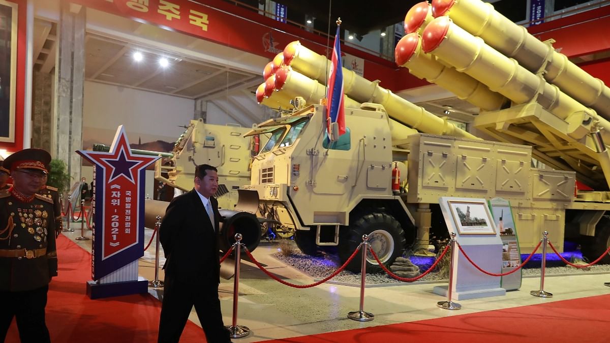Kim Jong Un looks at military weapons and vehicles on display at the Defence Development Exhibition, in Pyongyang, North Korea. Credit: KCNA via Reuters