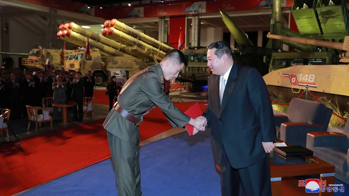North Korea's leader Kim Jong Un presents awards to military service personnel at the Defence Development Exhibition, in Pyongyang, North Korea. Credit: KCNA via Reuters