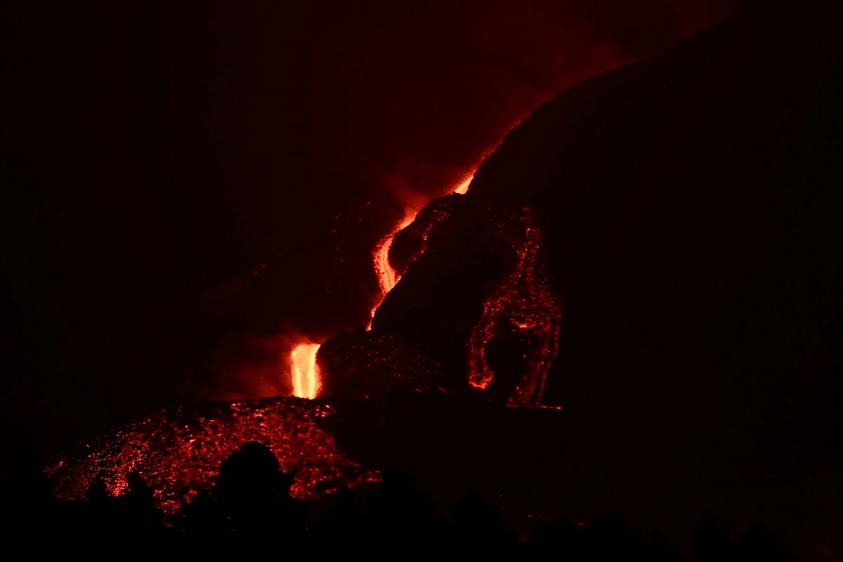 Lava flows down spewed by the Cumbre Vieja volcano as it continues to erupt on the Canary Island of La Palma. Credit: Reuters Photo