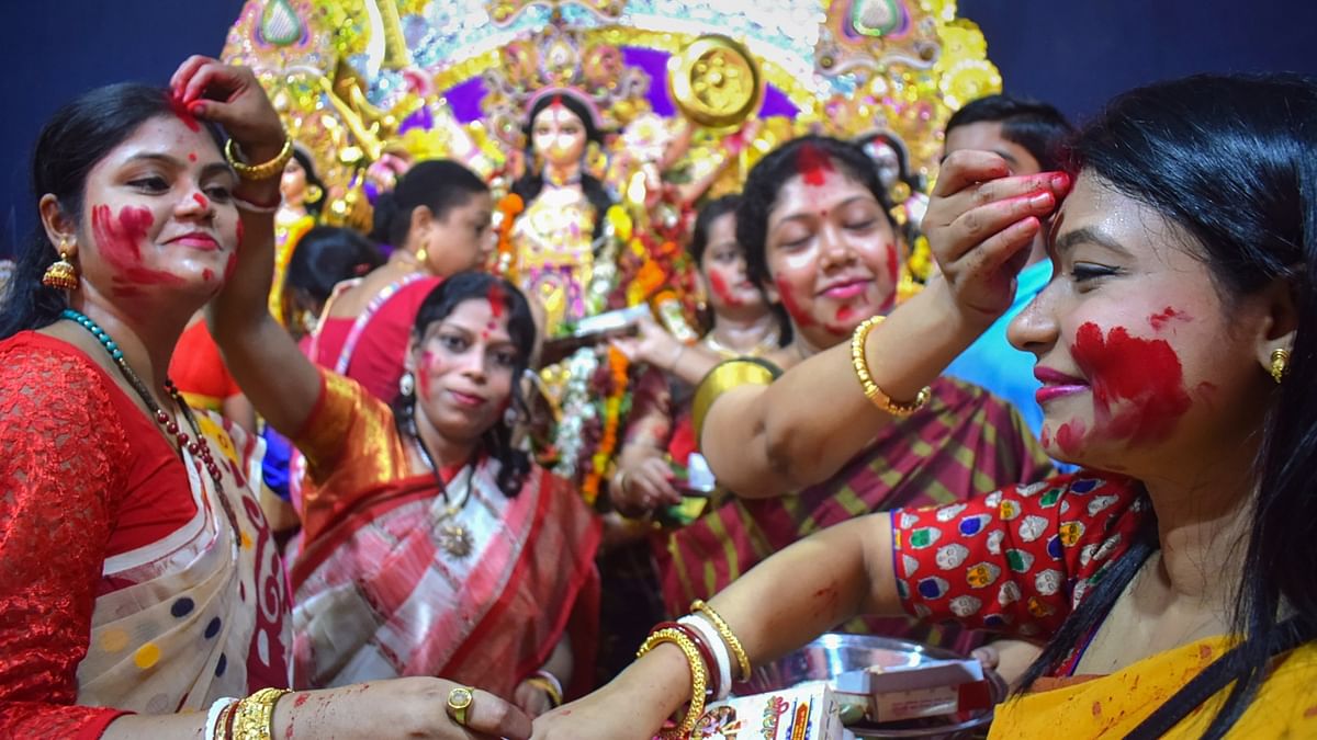 Women celebrate 'Sindoor Khela' with great zeal; see pics