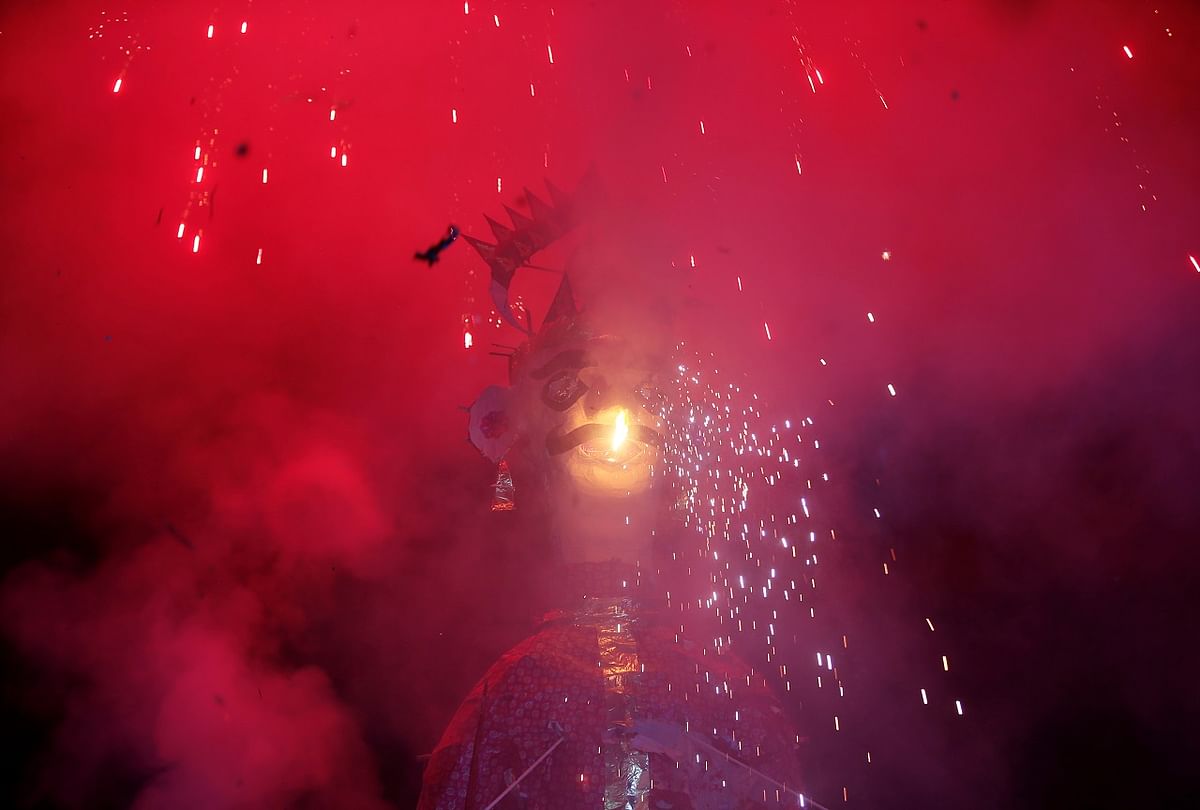 Fireworks explode as an effigy of Meghnad son of demon king Ravana, burns during Vijaya Dashmi or Dussehra festival celebrations in Ahmedabad. Credit: Reuters Photo